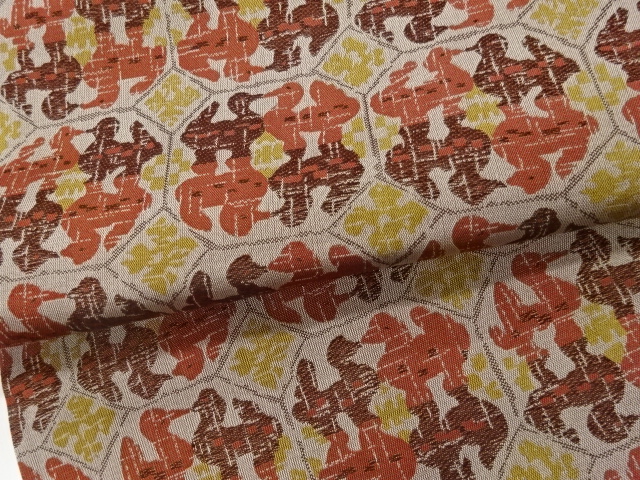  抽象向かい動物模様織出し開き名古屋帯（額縁仕立て）